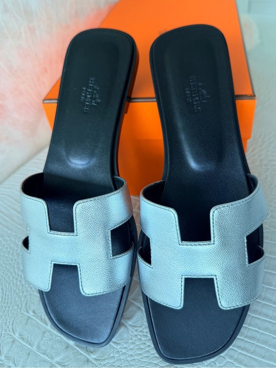 Hermes Shoes - BNIB HERMES ORAN SANDALS Size 40, slides silver metallic goatskin leather.
